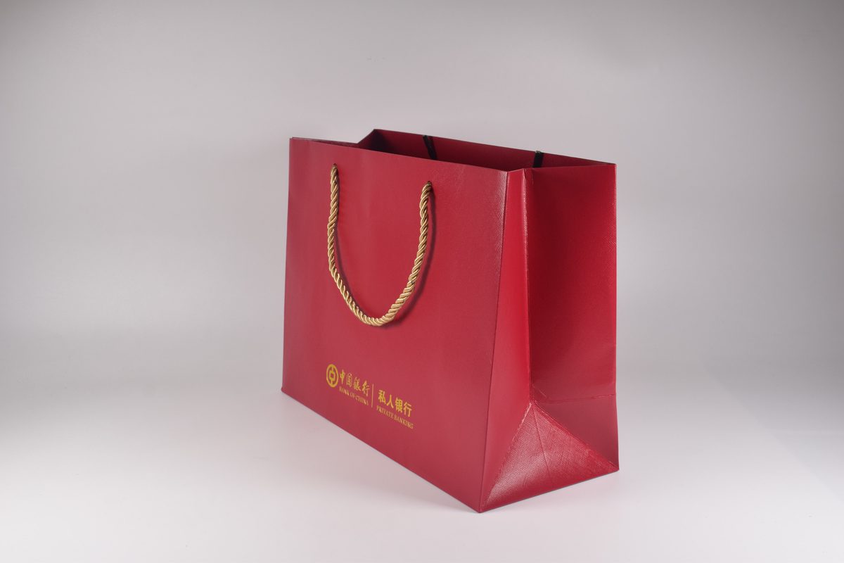 Red Gift Bag with Gold Rope Handles